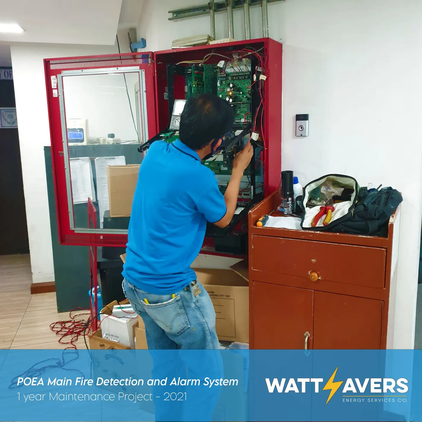 Wattsavers technician commissioning the POEA main fire detection and alarm panel